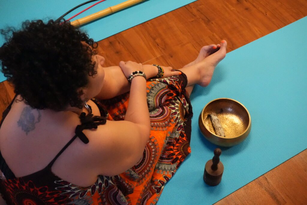NatNat practicing somatic nervous system support during The Return private 1:1 work